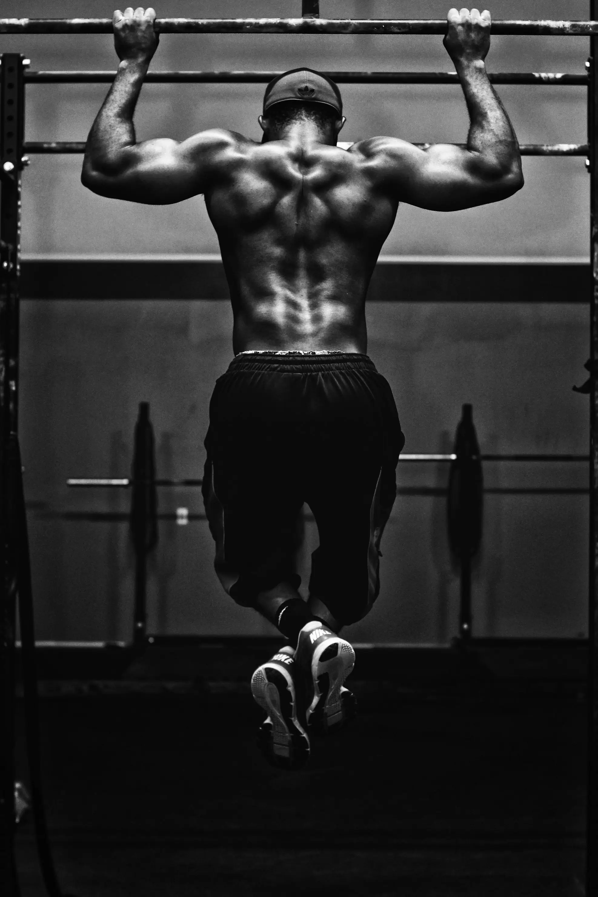 An athlete preparing for a heavy lift in a modern gym