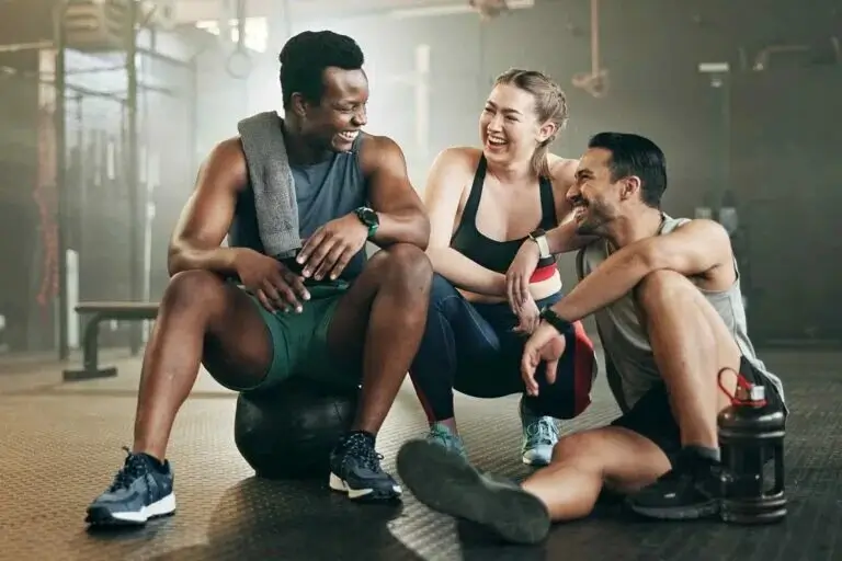 A group of members celebrating after a successful group class