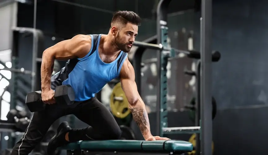 An individual athlete focused on their workout in a spacious area